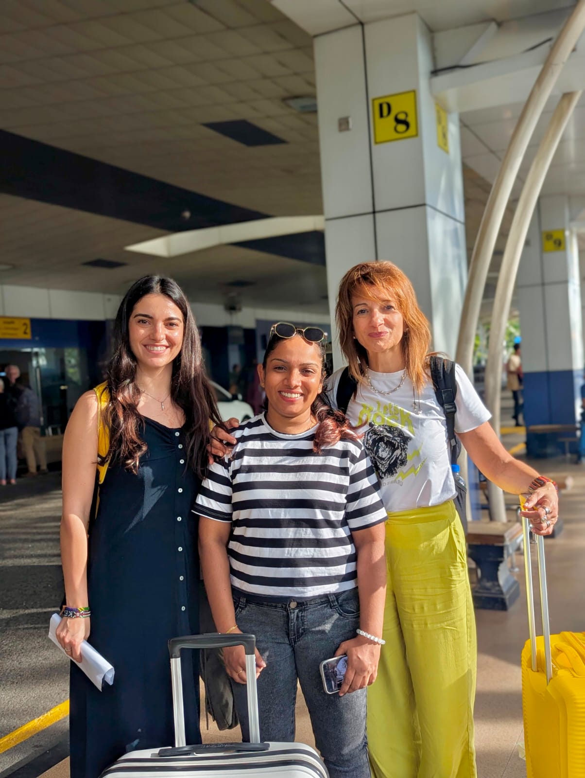 Warm airport welcome — friends arriving in Colombo